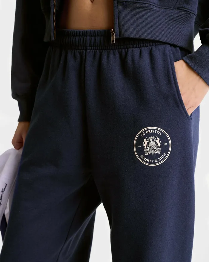 Sweatpants Women Sporty and Rich Bristol Crest 100th Sweatpant 8211 NavyCream