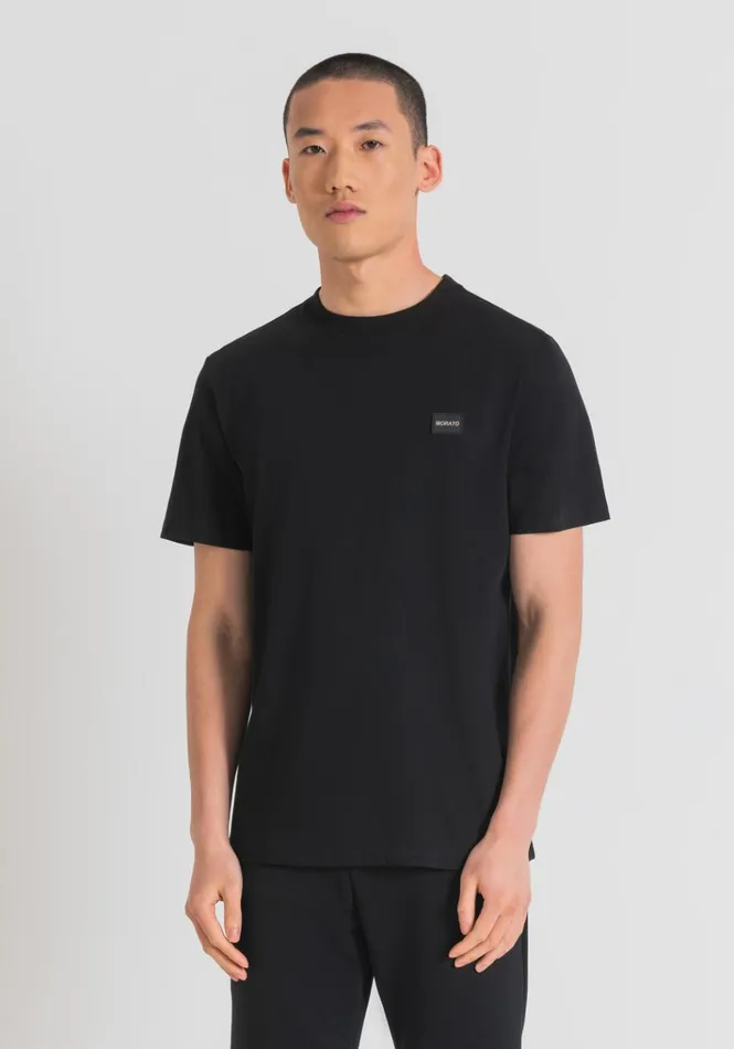 TShirts And Polo Men Antony Morato Regular Fit Cotton TShirt With Rubberised Plaque And Metal Logo Black TShirts And Polo Men Antony Morato Regular Fit Cotton TShirt With Rubberised Plaque And Metal Logo Black