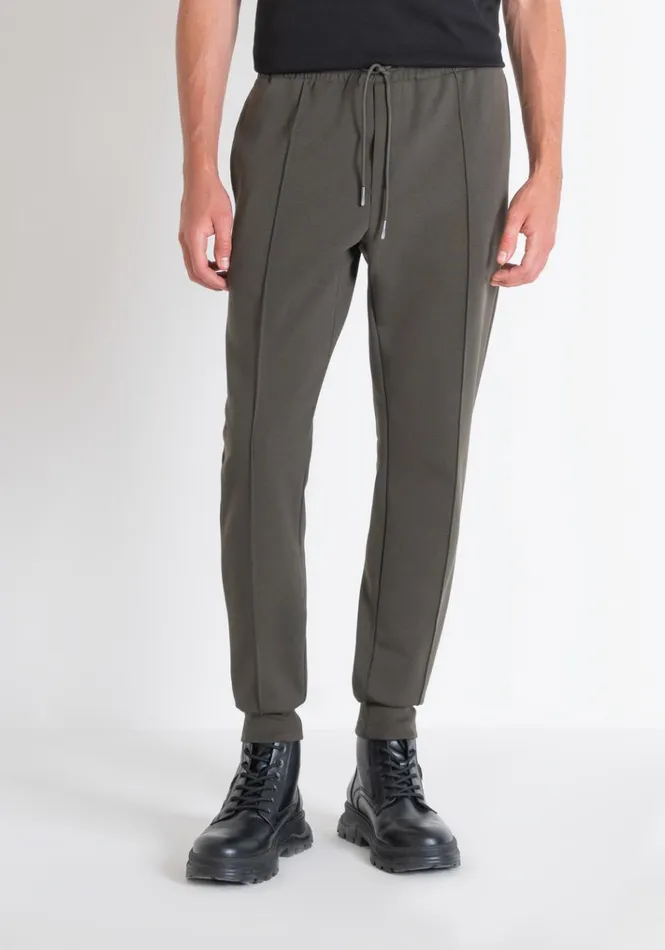 Trousers Men Antony Morato Carrot Fit Sweatpants In Green Cotton Blend With Elastic Dark Olive Green Trousers Men Antony Morato Carrot Fit Sweatpants In Green Cotton Blend With Elastic Dark Olive Green