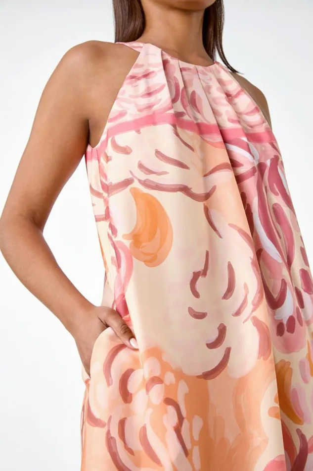 Women Peach Abstract Print Pocket Trapeze Dress Roman Dresses